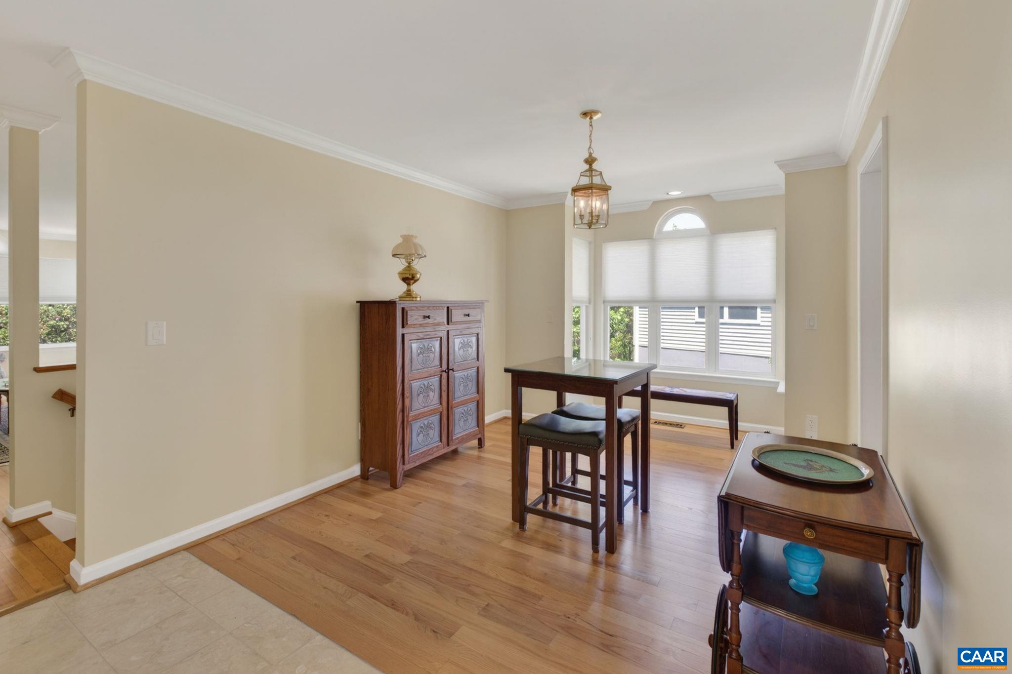 590 Mockingbird Way Charlottesville, VA 22901 - Photo 9 of 43 a view of a dining room with furniture and wooden floor