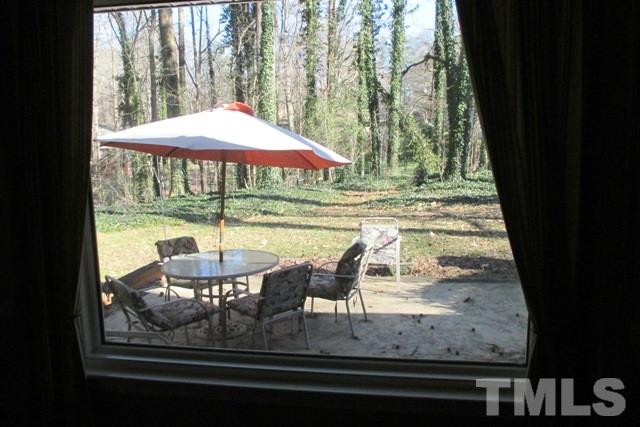 6600 King Lawrence Road Raleigh, NC 27607 - Photo 22 of 25 a view of a balcony with chair and table