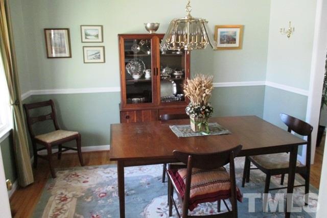 6600 King Lawrence Road Raleigh, NC 27607 - Photo 4 of 25 a view of a dining room with furniture