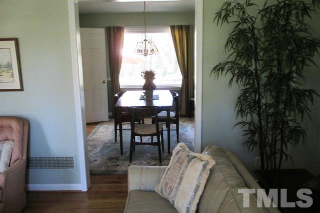 6600 King Lawrence Road Raleigh, NC 27607 - Photo 5 of 25 a view of a livingroom with furniture and window