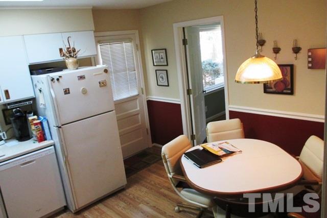 6600 King Lawrence Road Raleigh, NC 27607 - Photo 8 of 25 a workspace with furniture wooden floor and window