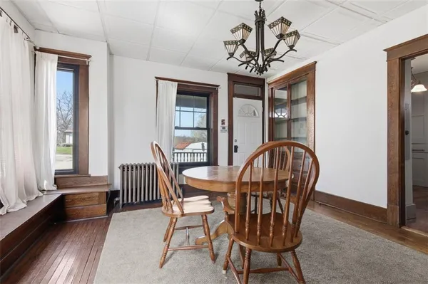 a kitchen with stainless steel appliances granite countertop a stove microwave and sink