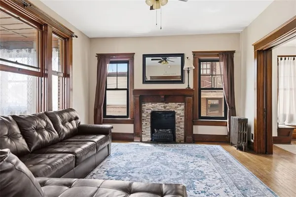 a living room with furniture and a rug