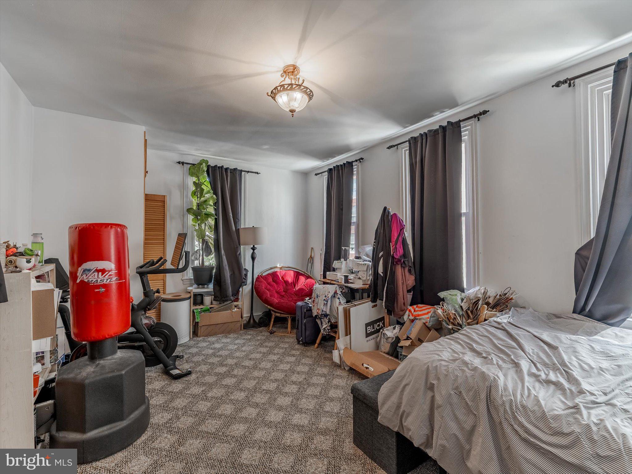 1108 Locust Street Philadelphia, PA 19107 - Photo 32 of 33 a bedroom with bed and a window