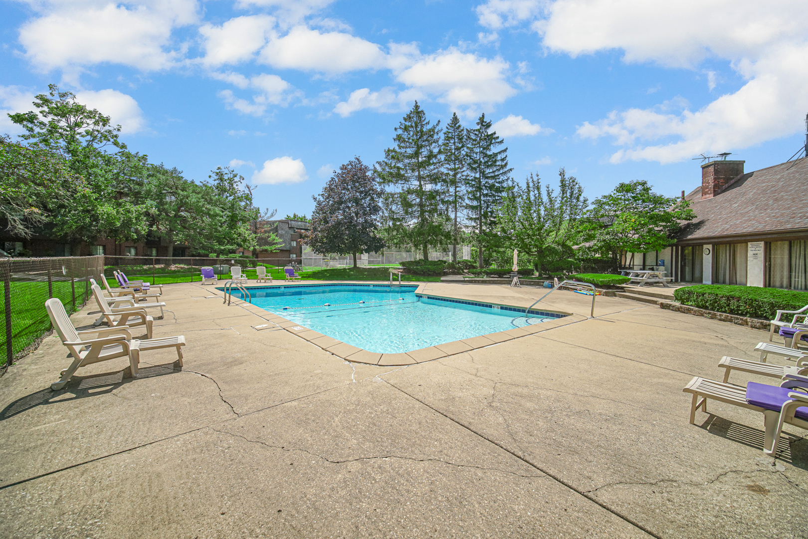 491 Timber Ridge Drive, Unit 101 Carol Stream, IL 60188 - Photo 18 of 19 a view of a swimming pool with a patio