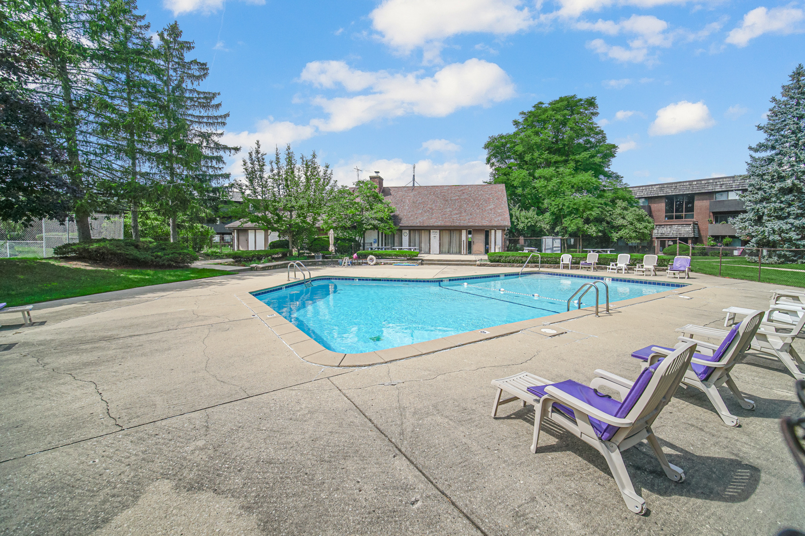 491 Timber Ridge Drive, Unit 101 Carol Stream, IL 60188 - Photo 19 of 19 a view of a swimming pool with lounge chair
