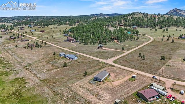 567 High Pasture Road Florissant, CO 80816 - Photo 46 of 48 View of rural area with a mountain backdrop