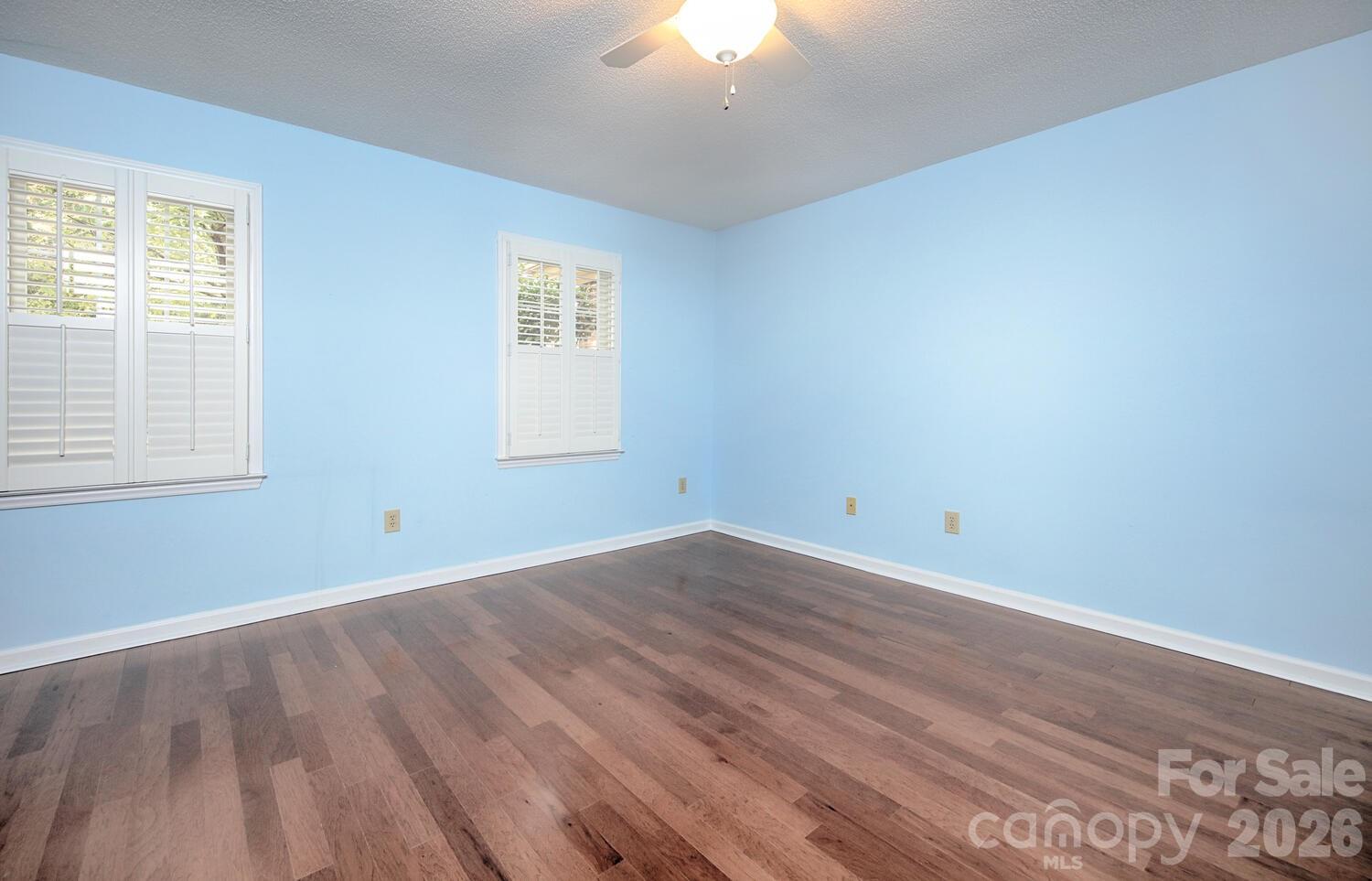 783 Union Street South Concord, NC 28025 - Photo 22 of 46 wooden floor in an empty room with a window