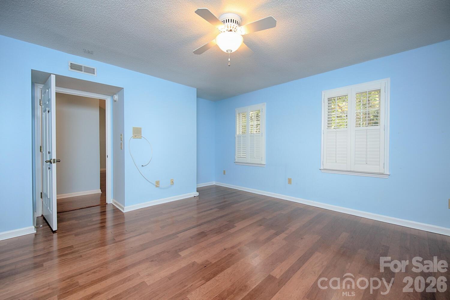 783 Union Street South Concord, NC 28025 - Photo 23 of 46 a view of an empty room with window and wooden floor