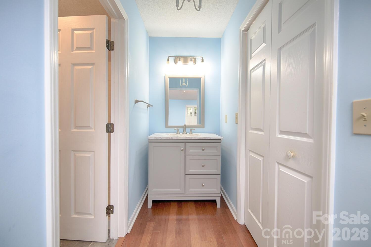 783 Union Street South Concord, NC 28025 - Photo 25 of 46 a bathroom with a sink and a mirror