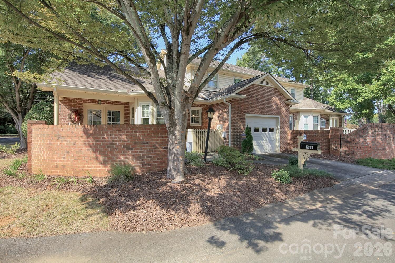 783 Union Street South Concord, NC 28025 - Photo 3 of 46 a front view of a house with garden
