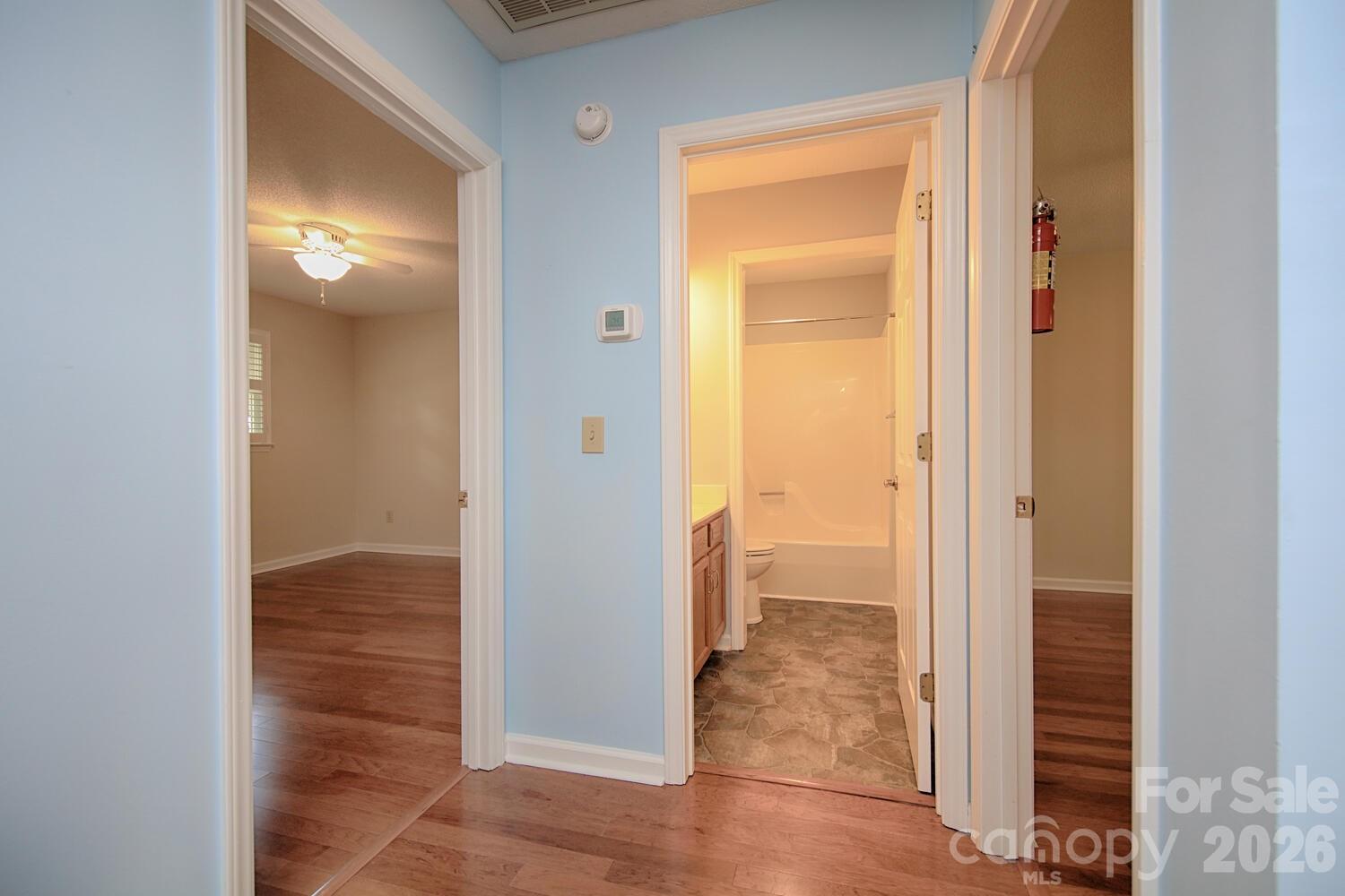 783 Union Street South Concord, NC 28025 - Photo 43 of 46 a view of a bathroom from a hallway