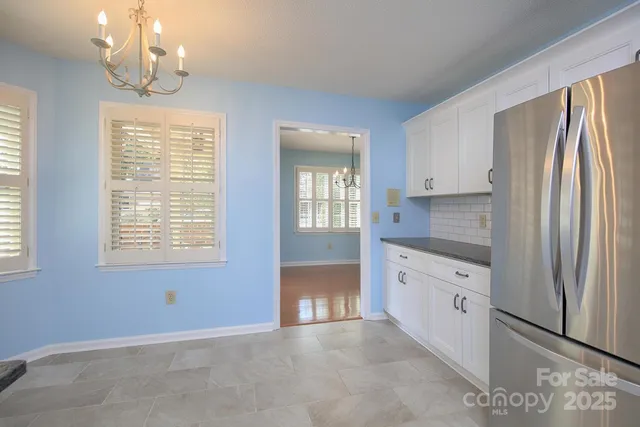a large kitchen with window