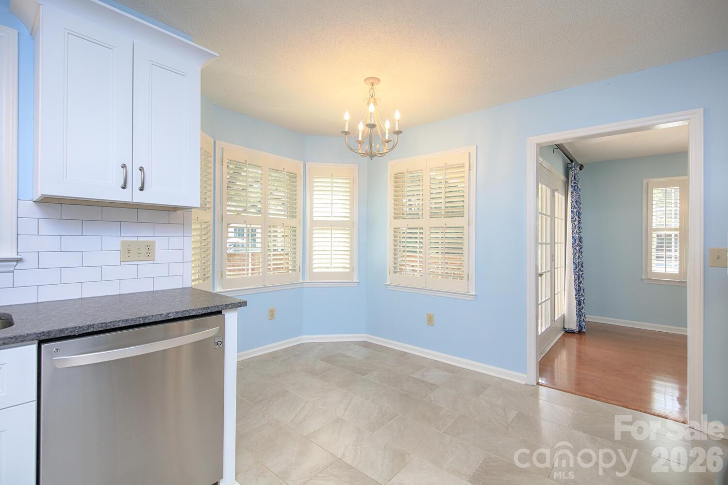 783 Union Street South Concord, NC 28025 - Photo 9 of 46 a kitchen that has a lot of cabinets in it