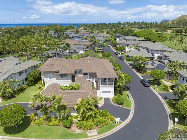 an aerial view of a house with a garden