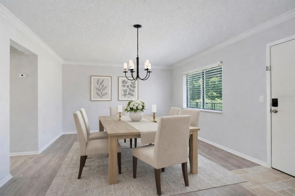 129 Blue Pointe Way, Unit 340 Altamonte Springs, FL 32701 - Photo 3 of 25 a view of a dining room with furniture window and outside view
