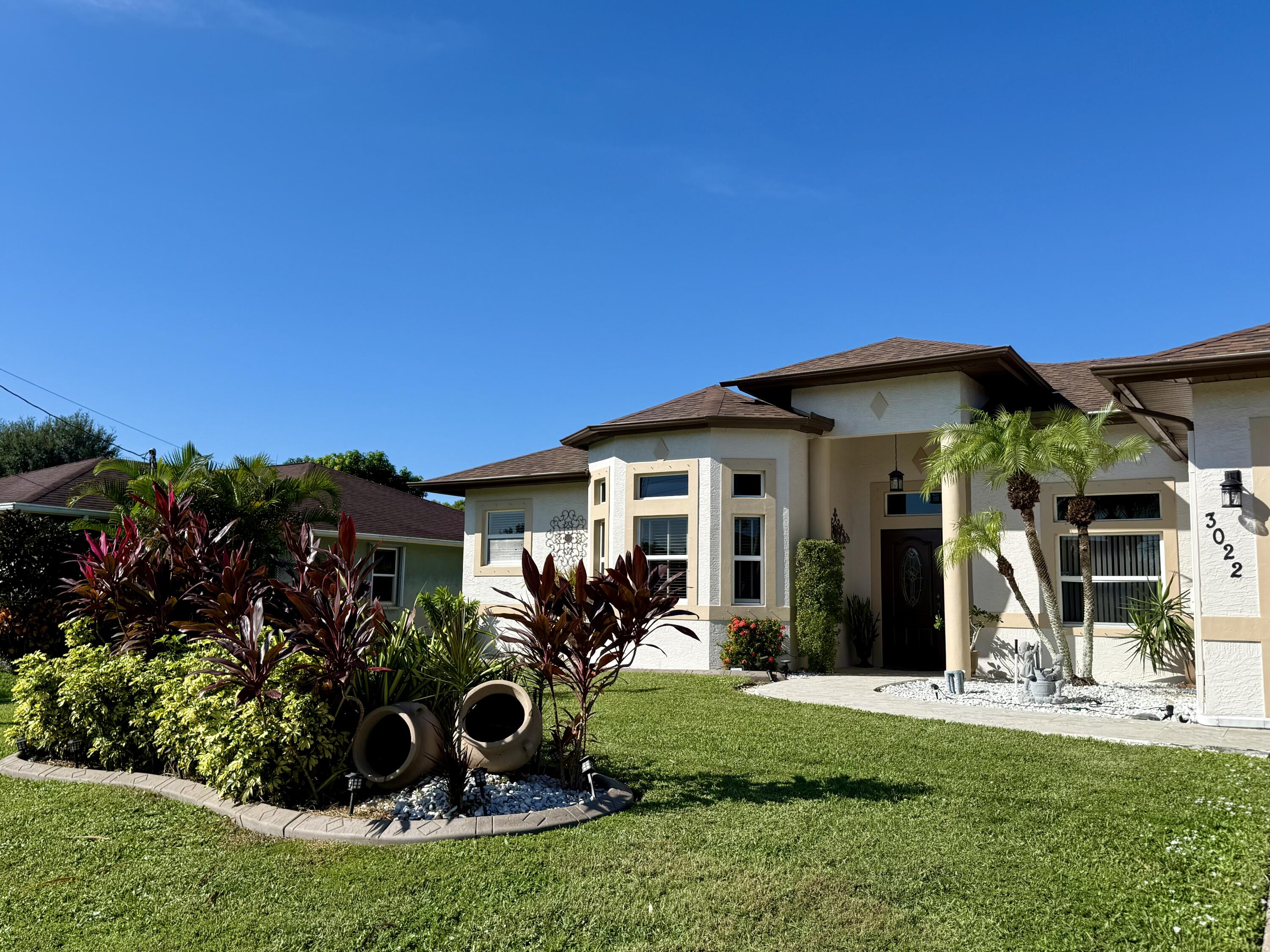 3022 Southeast Wake Road Port St. Lucie, FL 34984 - Photo 3 of 20 Front yard
