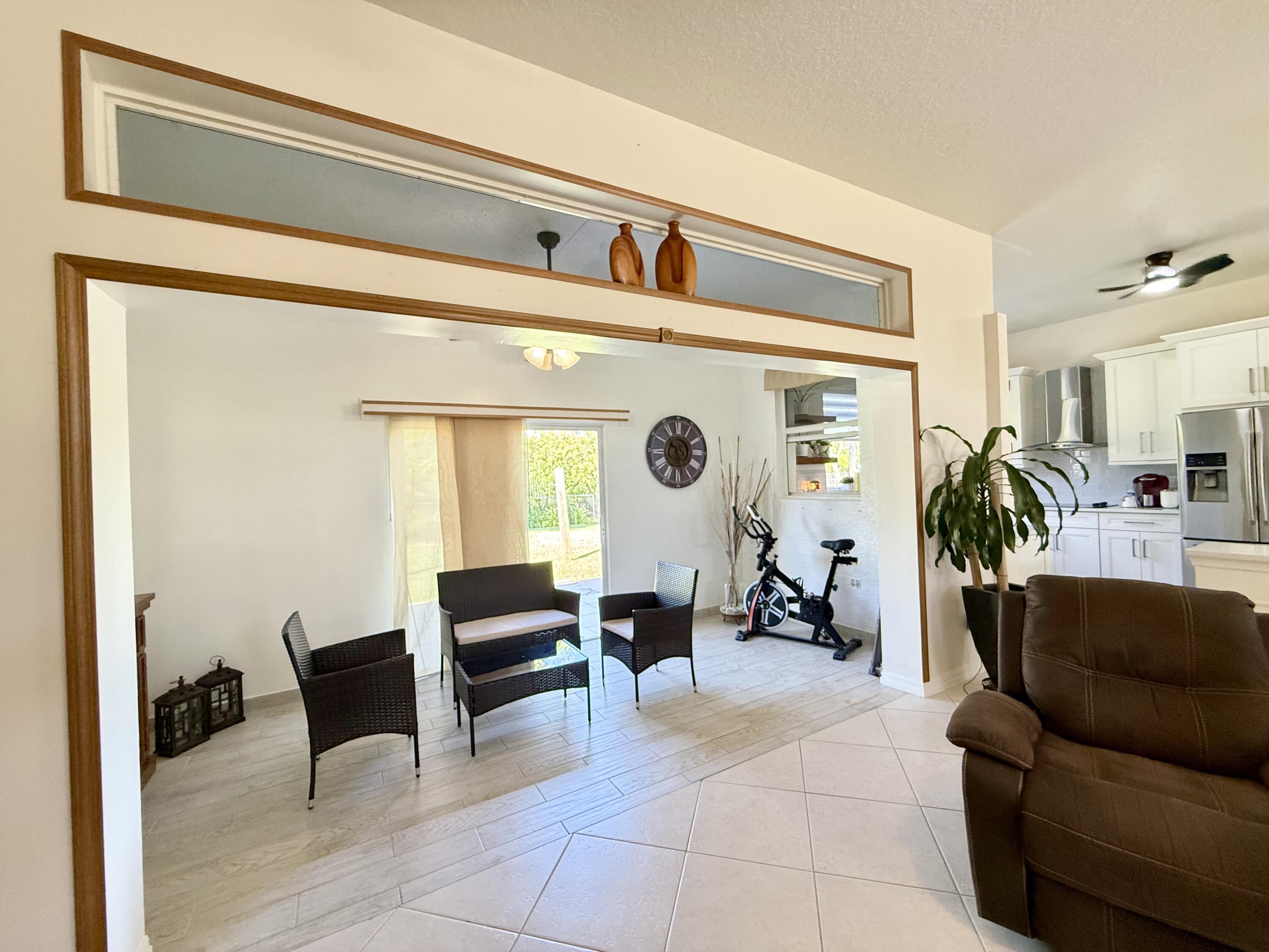 3022 Southeast Wake Road Port St. Lucie, FL 34984 - Photo 8 of 20 Enclosed Lanai