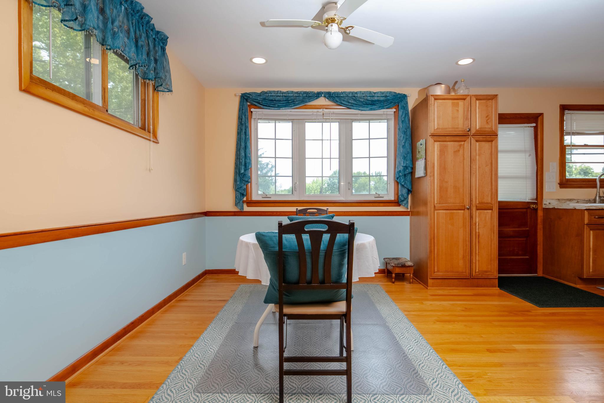2319 Reckord Road Joppa, MD 21085 - Photo 14 of 45 a hallway with a large window and chandelier