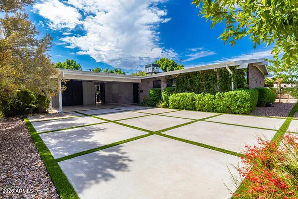 a house with trees in the background