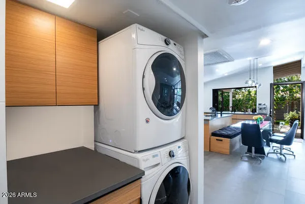 a view of livingroom with washer and dryer
