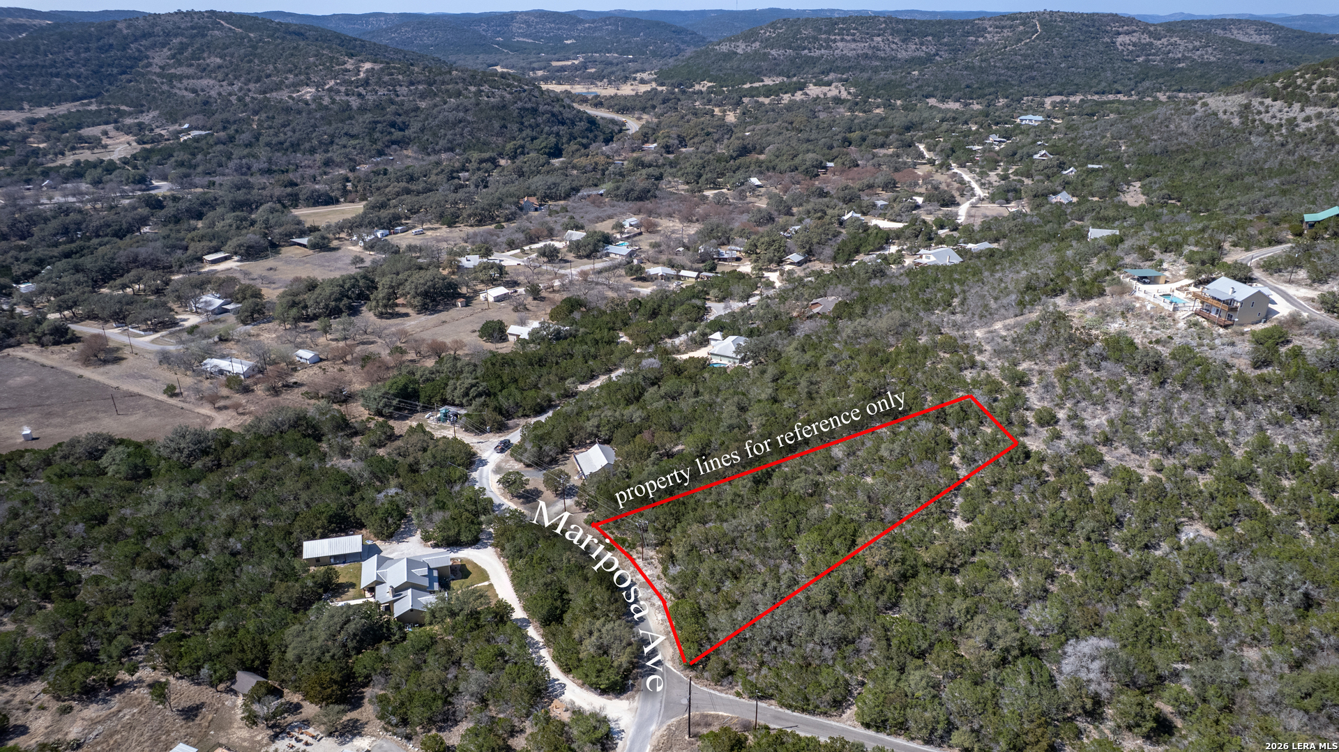 439 Mariposa Concan, TX 78838 - Photo 7 of 8 an aerial view of city