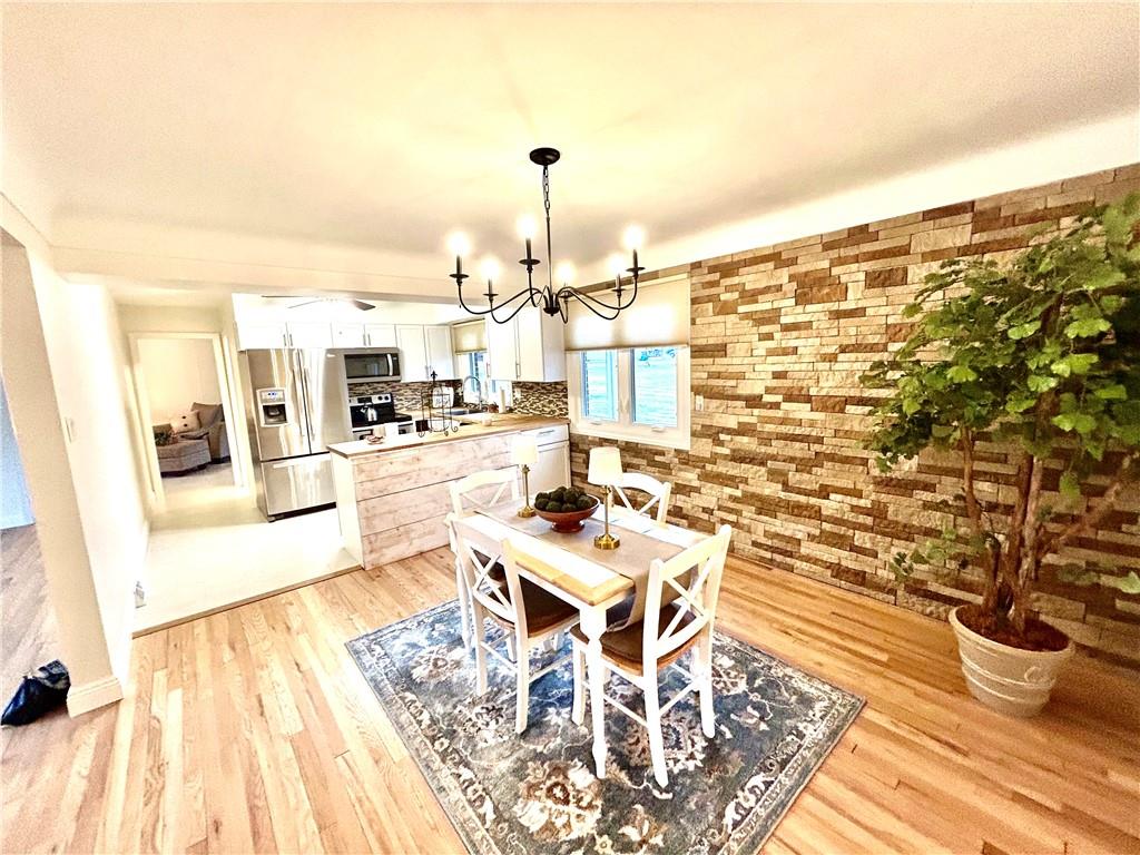 113 Memorial Street Dunbar, PA 15431 - Photo 12 of 42 a living room with a patio