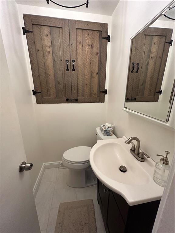 113 Memorial Street Dunbar, PA 15431 - Photo 17 of 42 a bathroom with a sink and a mirror