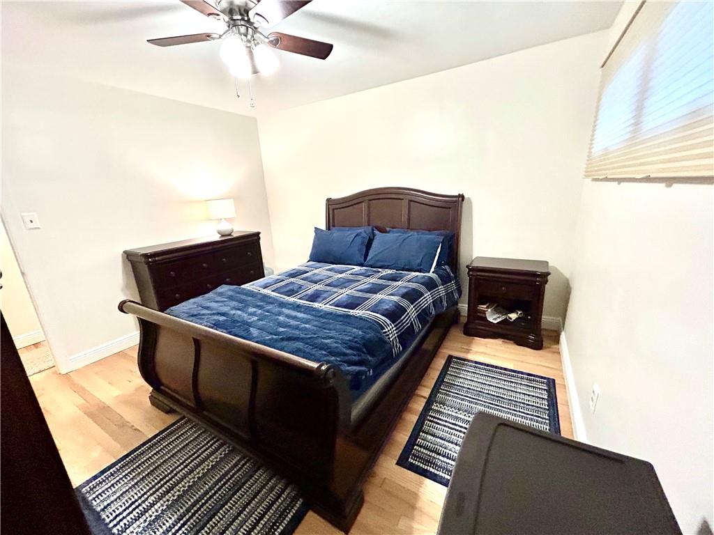 113 Memorial Street Dunbar, PA 15431 - Photo 21 of 42 a bed sitting in a bedroom next to a window