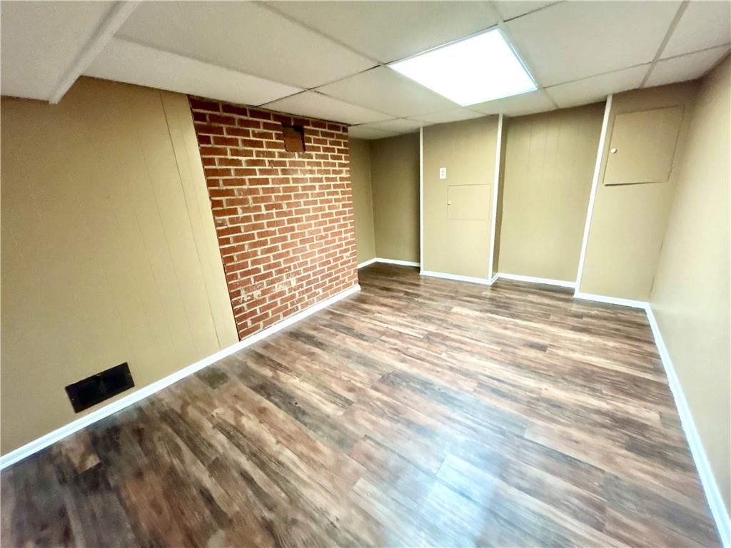 113 Memorial Street Dunbar, PA 15431 - Photo 31 of 42 a view of empty room with wooden floor and fan