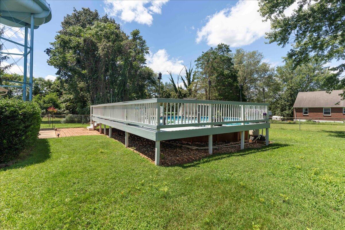 113 Ridge Street Madison Heights, VA 24572 - Photo 20 of 36 a view of a deck with a yard
