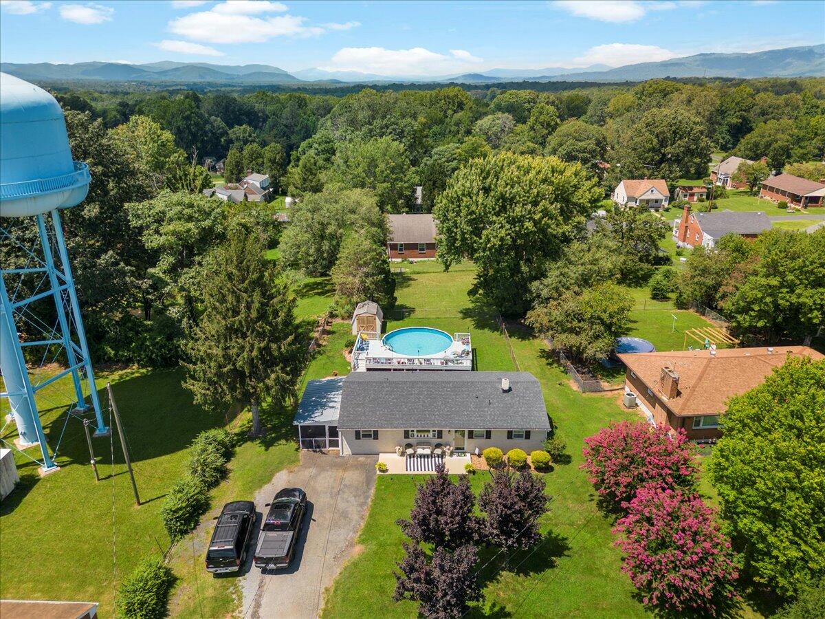 113 Ridge Street Madison Heights, VA 24572 - Photo 23 of 36 an aerial view of a house with a yard