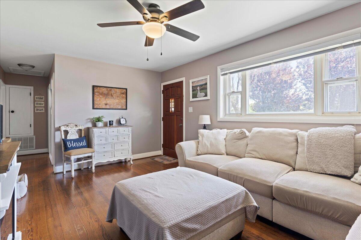 113 Ridge Street Madison Heights, VA 24572 - Photo 29 of 36 a living room with furniture and wooden floor