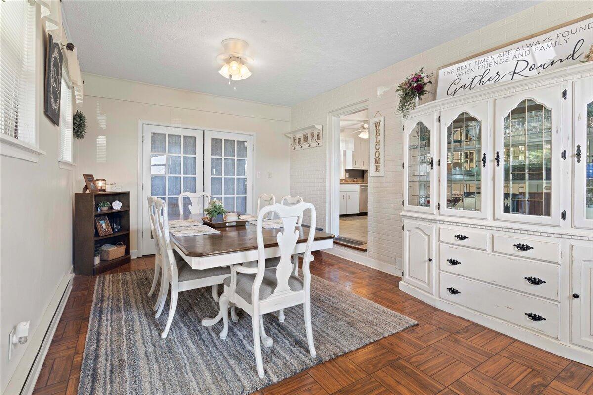 113 Ridge Street Madison Heights, VA 24572 - Photo 9 of 36 a view of a dining room with furniture and wooden floor