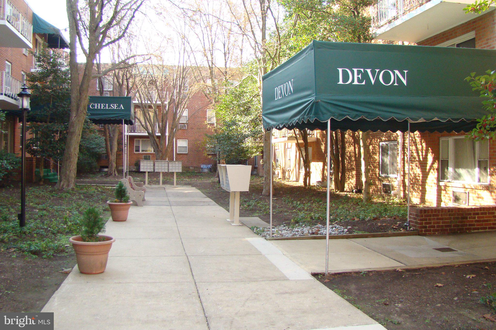 1600 Church Road, Unit D104 Wyncote, PA 19095 - Photo 11 of 11 Charming pathways in a serene setting.