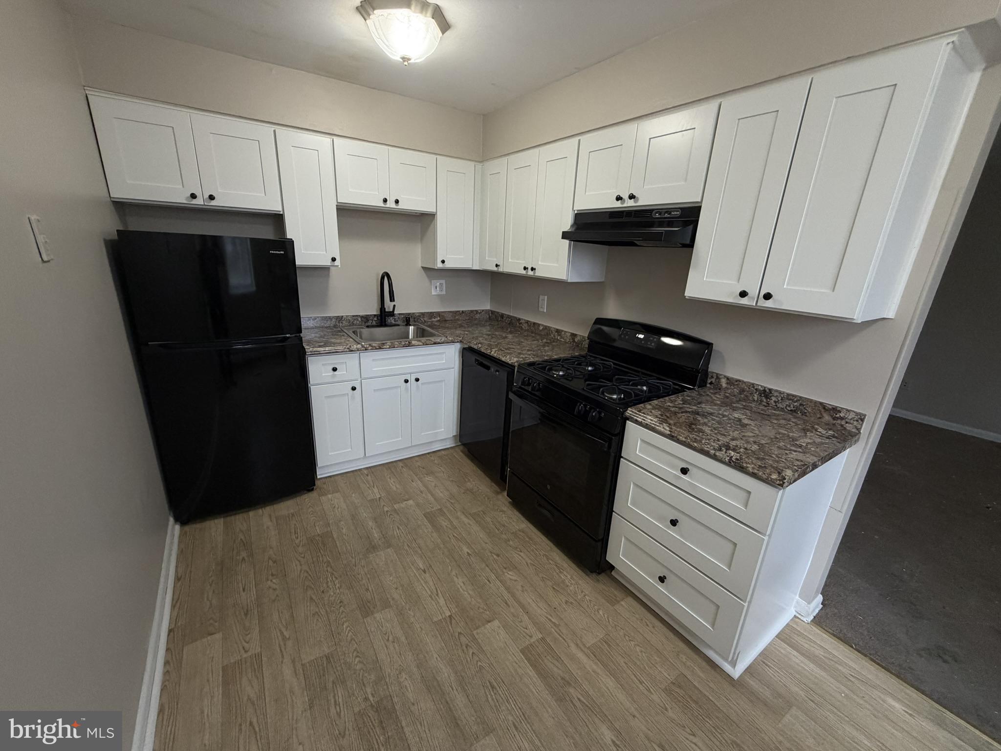 1600 Church Road, Unit D104 Wyncote, PA 19095 - Photo 2 of 11 Modern kitchen with sleek finishes.