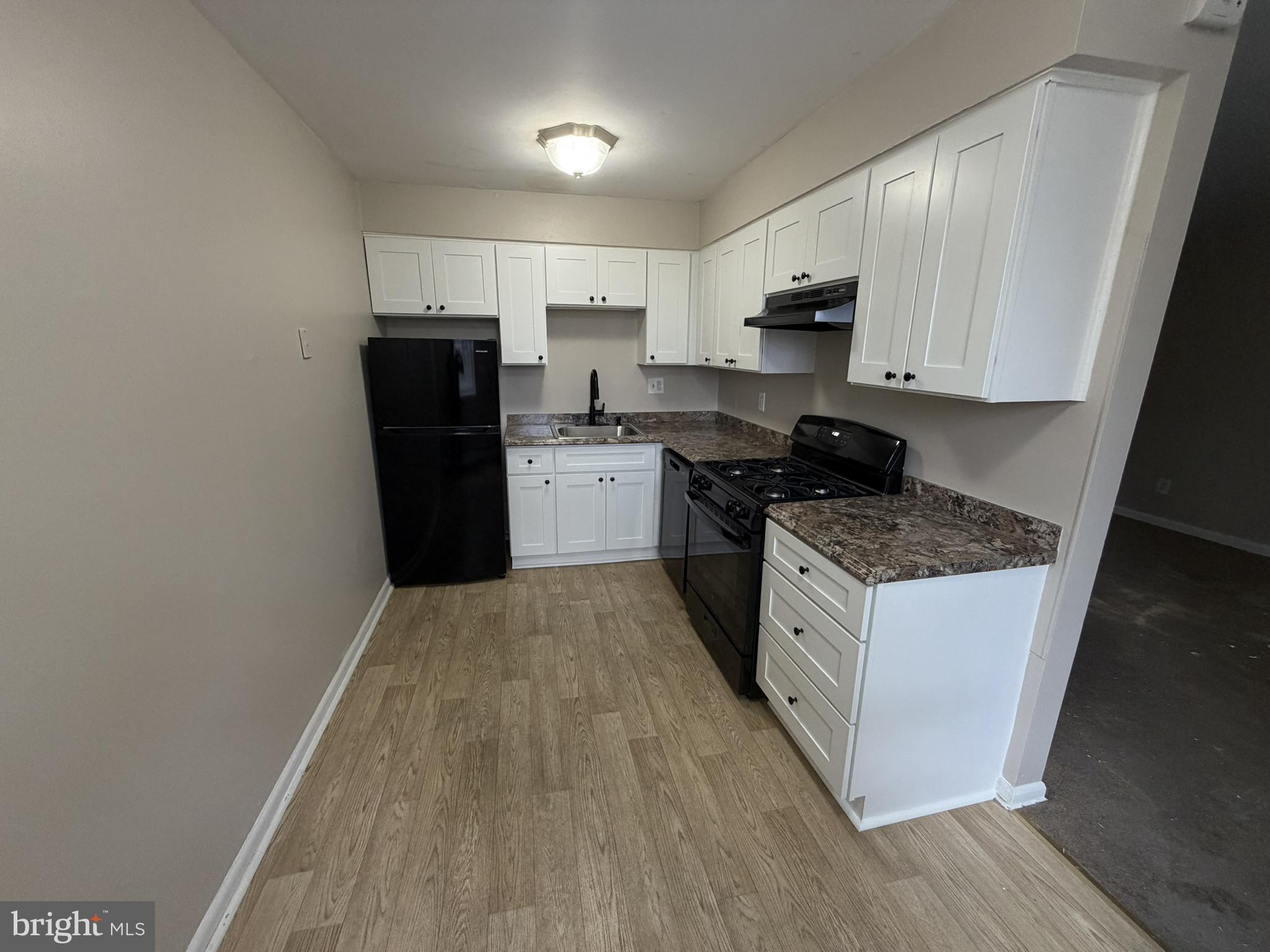 1600 Church Road, Unit D104 Wyncote, PA 19095 - Photo 3 of 11 Modern kitchen with sleek finishes.