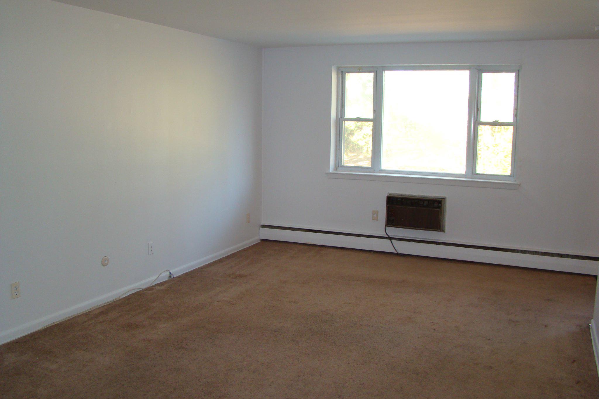 1600 Church Road, Unit D104 Wyncote, PA 19095 - Photo 6 of 11 Spacious living room with natural light.