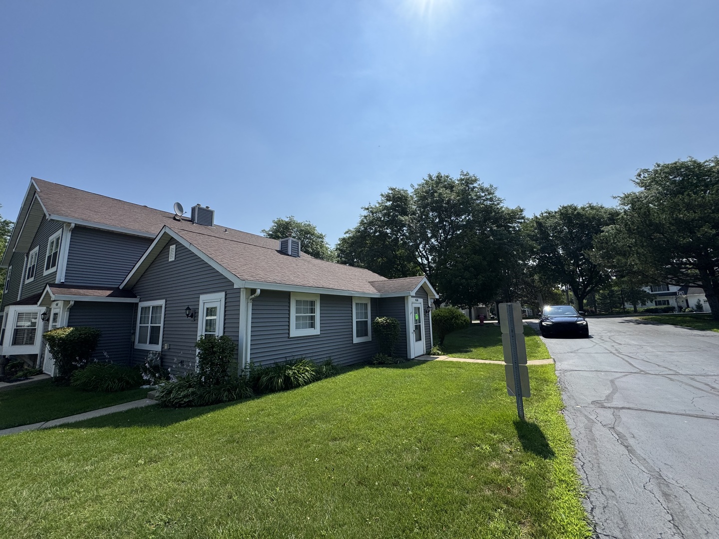 458 North Lake Shore Drive Palatine, IL 60067 - Photo 1 of 25 a view of a house with a backyard and a tree