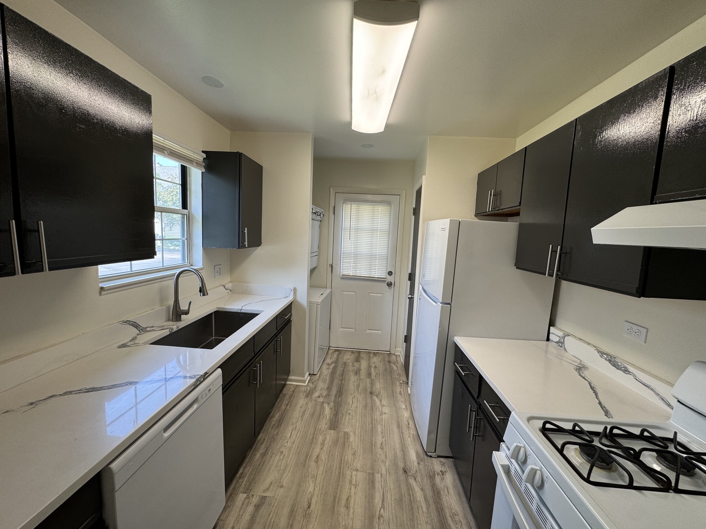458 North Lake Shore Drive Palatine, IL 60067 - Photo 3 of 25 a kitchen with stainless steel appliances a sink stove and refrigerator