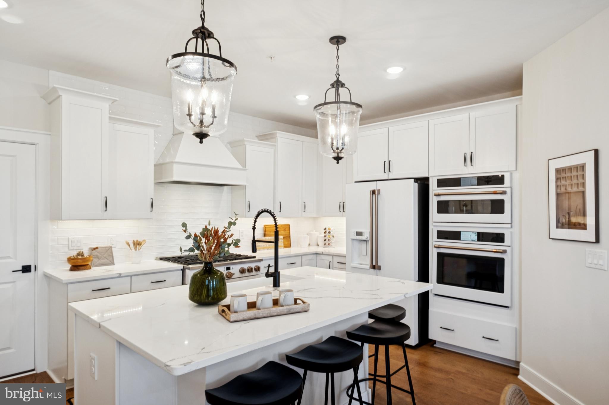 14960 Deco Circle Chantilly, VA 20151 - Photo 15 of 35 a kitchen with refrigerator cabinets and stove