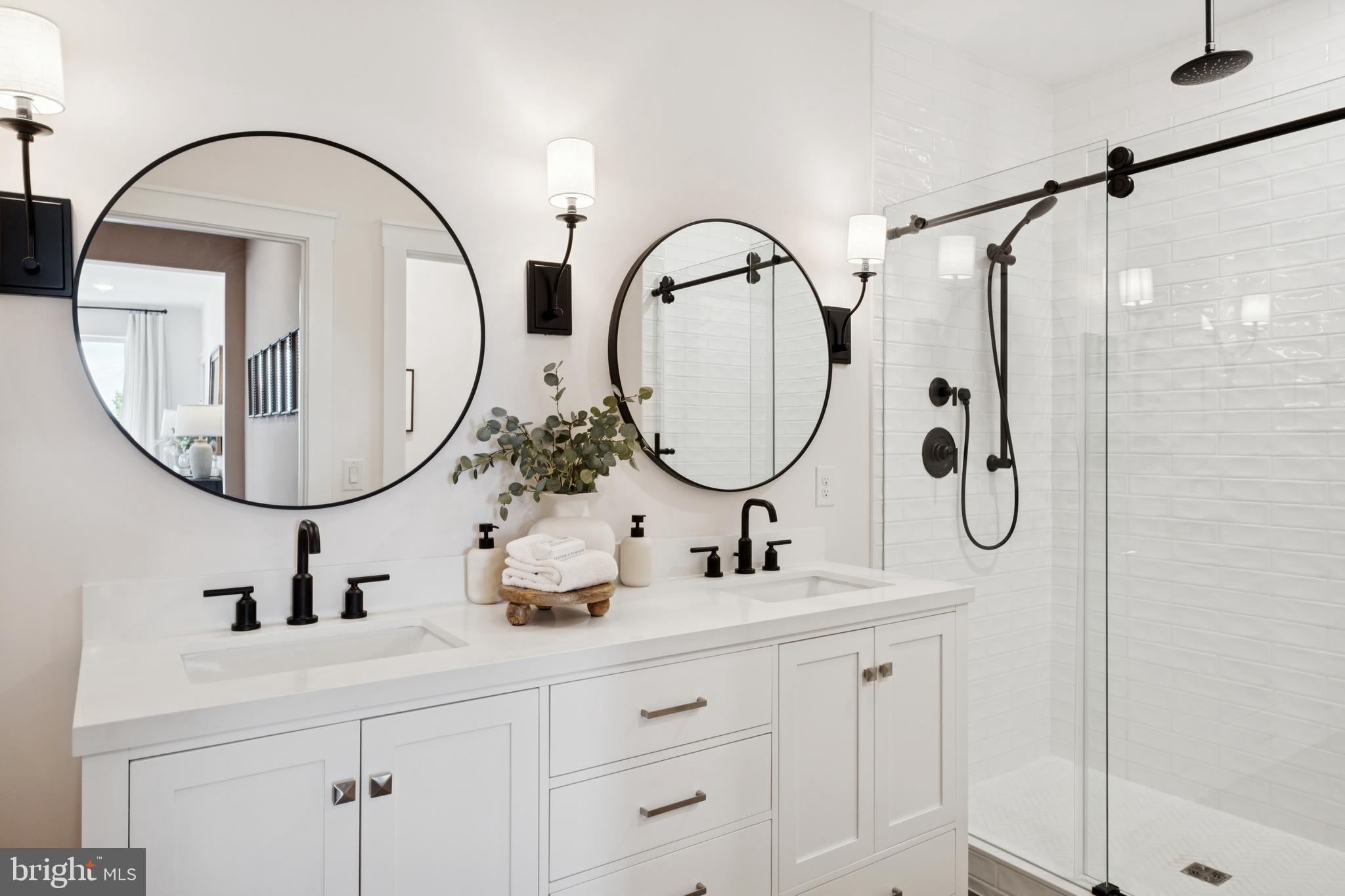 14960 Deco Circle Chantilly, VA 20151 - Photo 24 of 35 a bathroom with a sink and a mirror