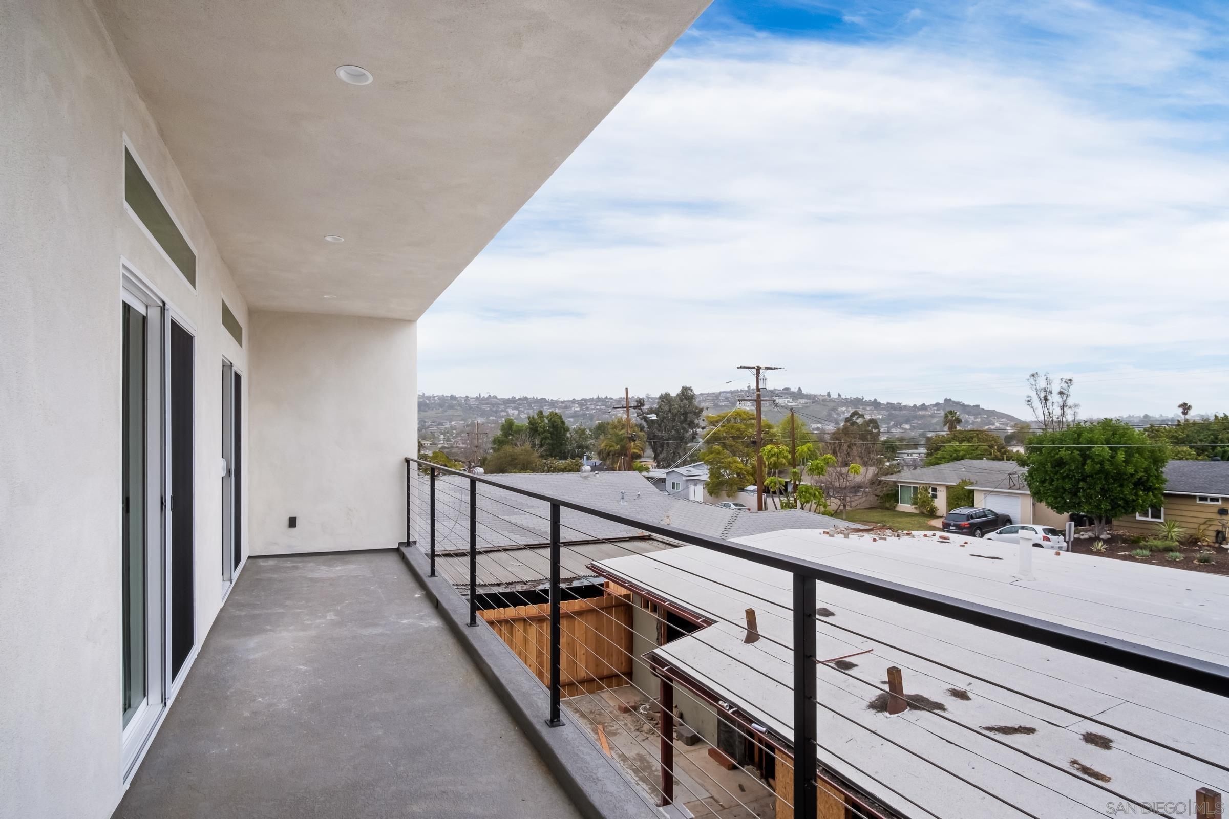 5230 Rincon Street San Diego, CA 92115 - Photo 22 of 29 a view of balcony with furniture