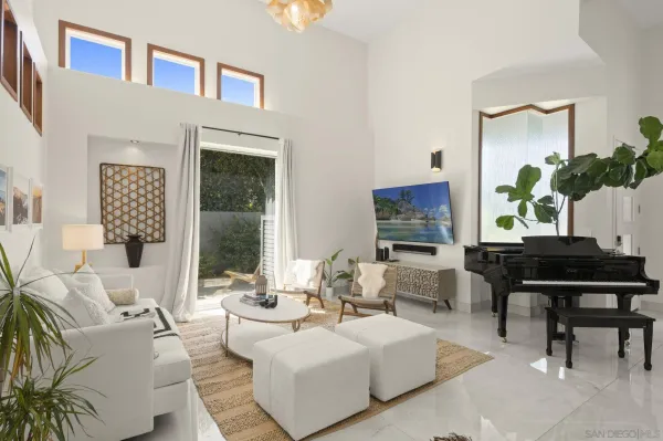 a living room with furniture and a window