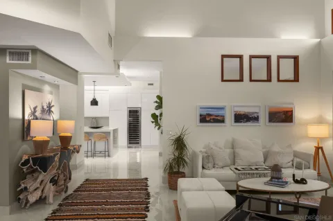 a living room with furniture and a rug