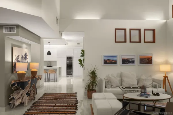 a living room with furniture and a rug