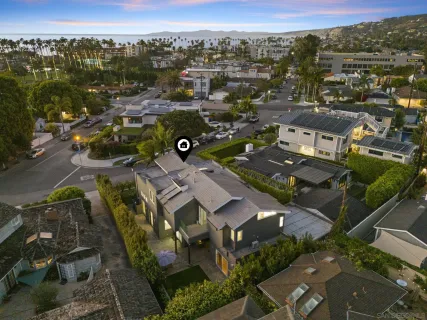 an aerial view of a city with lots of residential buildings