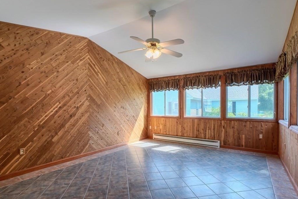 142 East Meadow Road Lowell, MA 01854 - Photo 8 of 28 an empty room with windows