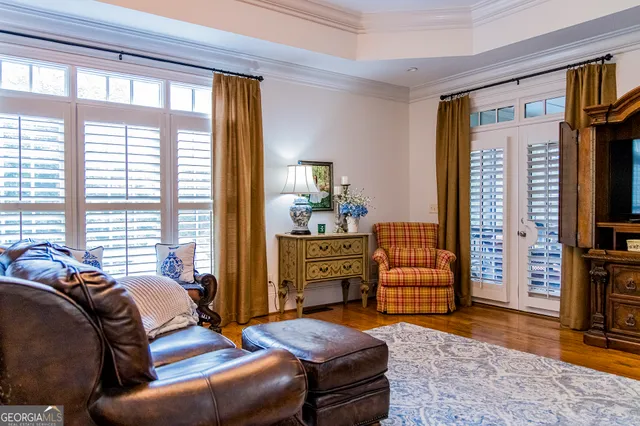 a view of entryway with wooden floor