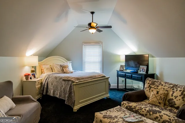 a bathroom with a sink double vanity and a mirror
